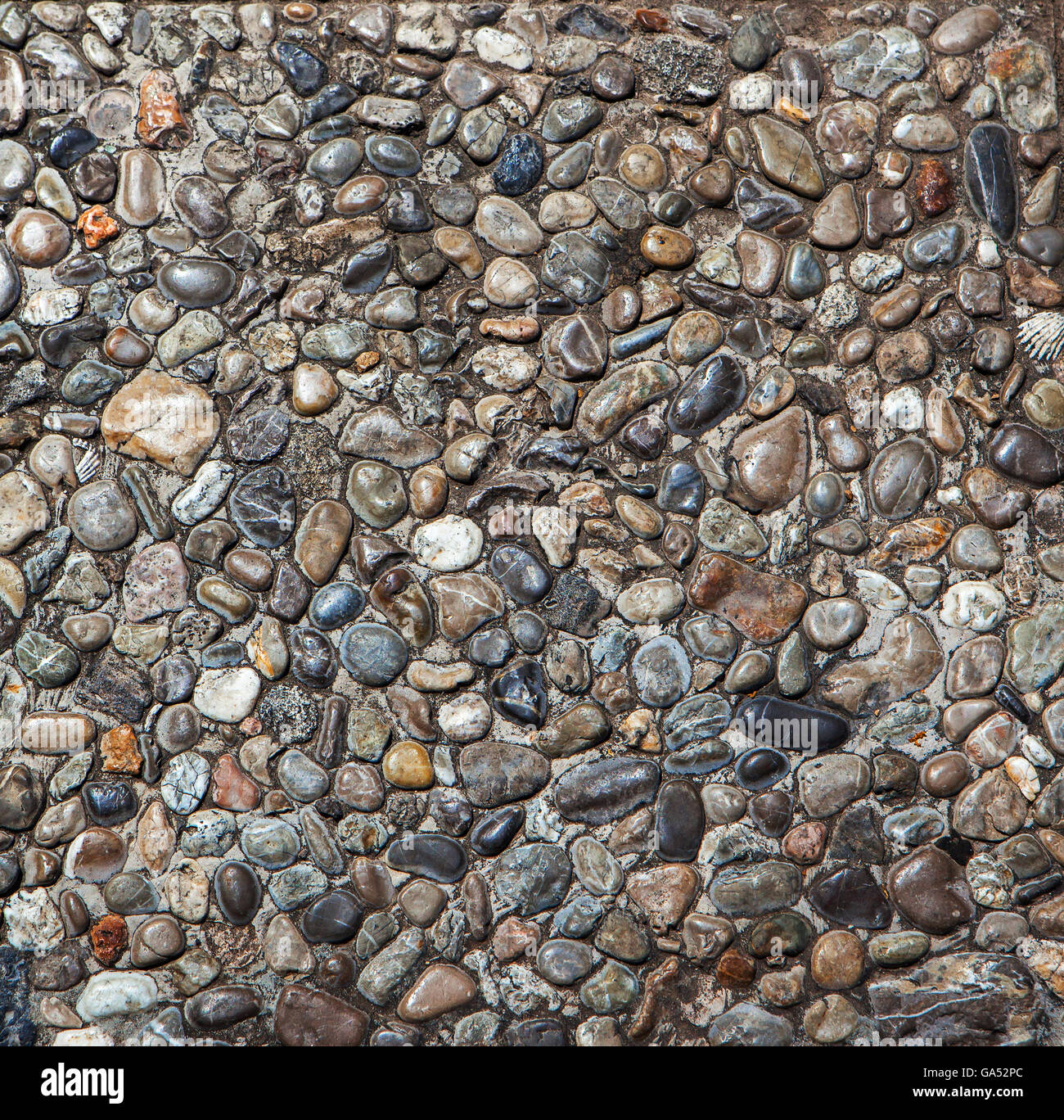 Pebble stone floor tile texture and seamless background Stock Photo