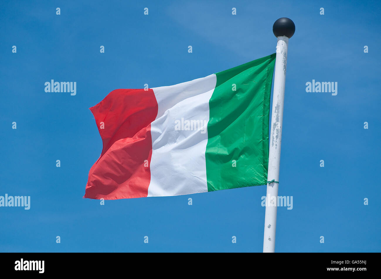 beautiful italy flag flying in the blue sky Stock Photo