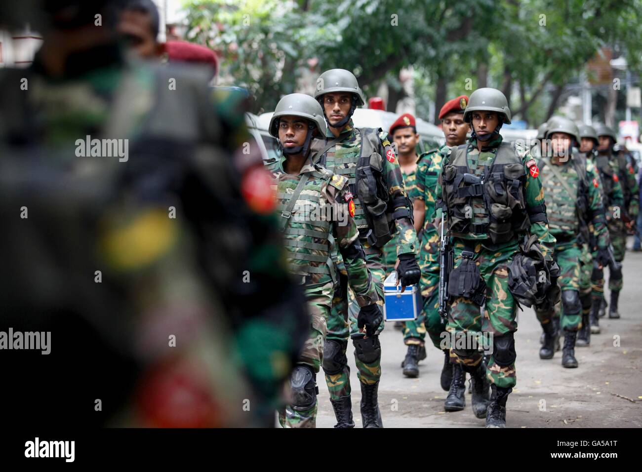 Dhaka, Bangladesh. 2nd July, 2016. After rescue operation Army soldiers go back from the Holey Artisan Bakery. Six gunmen have been shot and killed during an operation to end a hostage situation by military commandos, while the gunmen killed two policemen earlier and thirteen hostages have been rescued. Credit:  K M Asad/ZUMA Wire/Alamy Live News Stock Photo