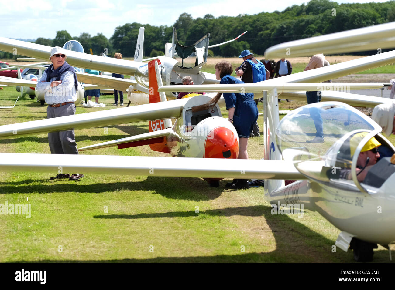 Shobdon airfield, Herefordshire, UK July 2016. Competitors and pilots enjoy a warm sunny day with temperatures up to 20c at the airfield on Day 2 of 'Competition Enterprise' a week long gliding competition at Shobdon. Stock Photo