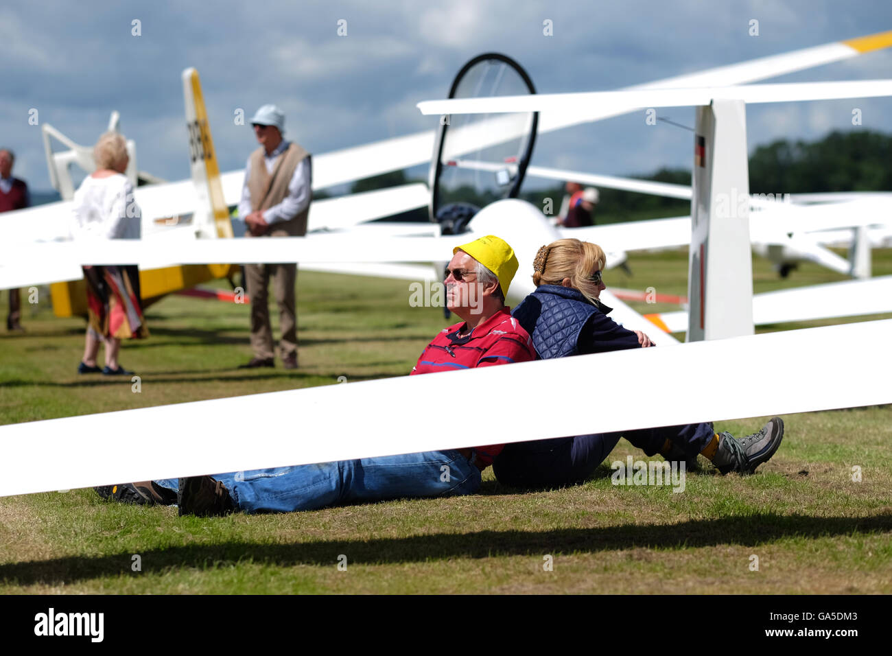 Shobdon airfield, Herefordshire, UK July, 2016. Competitors and pilots enjoy a warm sunny day with temperatures up to 20c at the airfield on Day 2 of 'Competition Enterprise' a week long gliding competition at Shobdon. Stock Photo