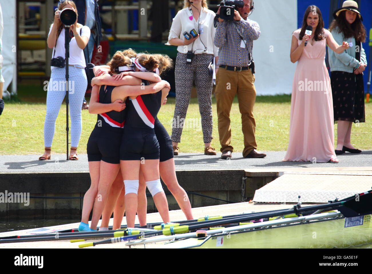Rowers from all over the world came to the annual Henley Royal Regatta 2016. Gloucester Rowing Club celebrates their victory in the first race of the day. Stock Photo