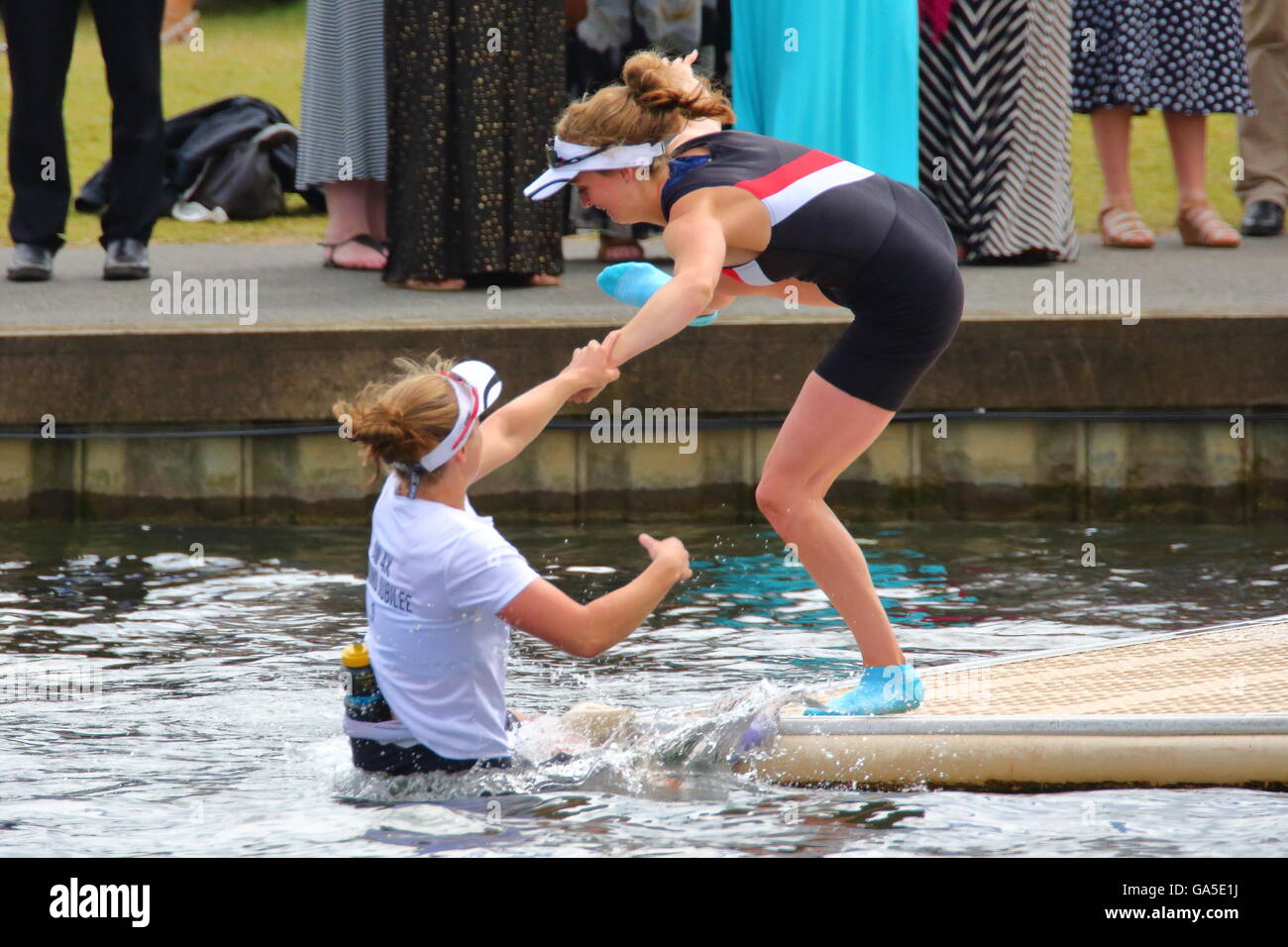 Rowers from all over the world came to the annual Henley Royal Regatta 2016. Gloucester Rowing Club celebrates their victory in the first race of the day. Stock Photo