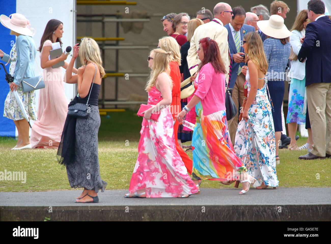 Rowers from all over the world came to the annual Henley Royal Regatta 2016. Ladies dressed for the occasion. Stock Photo