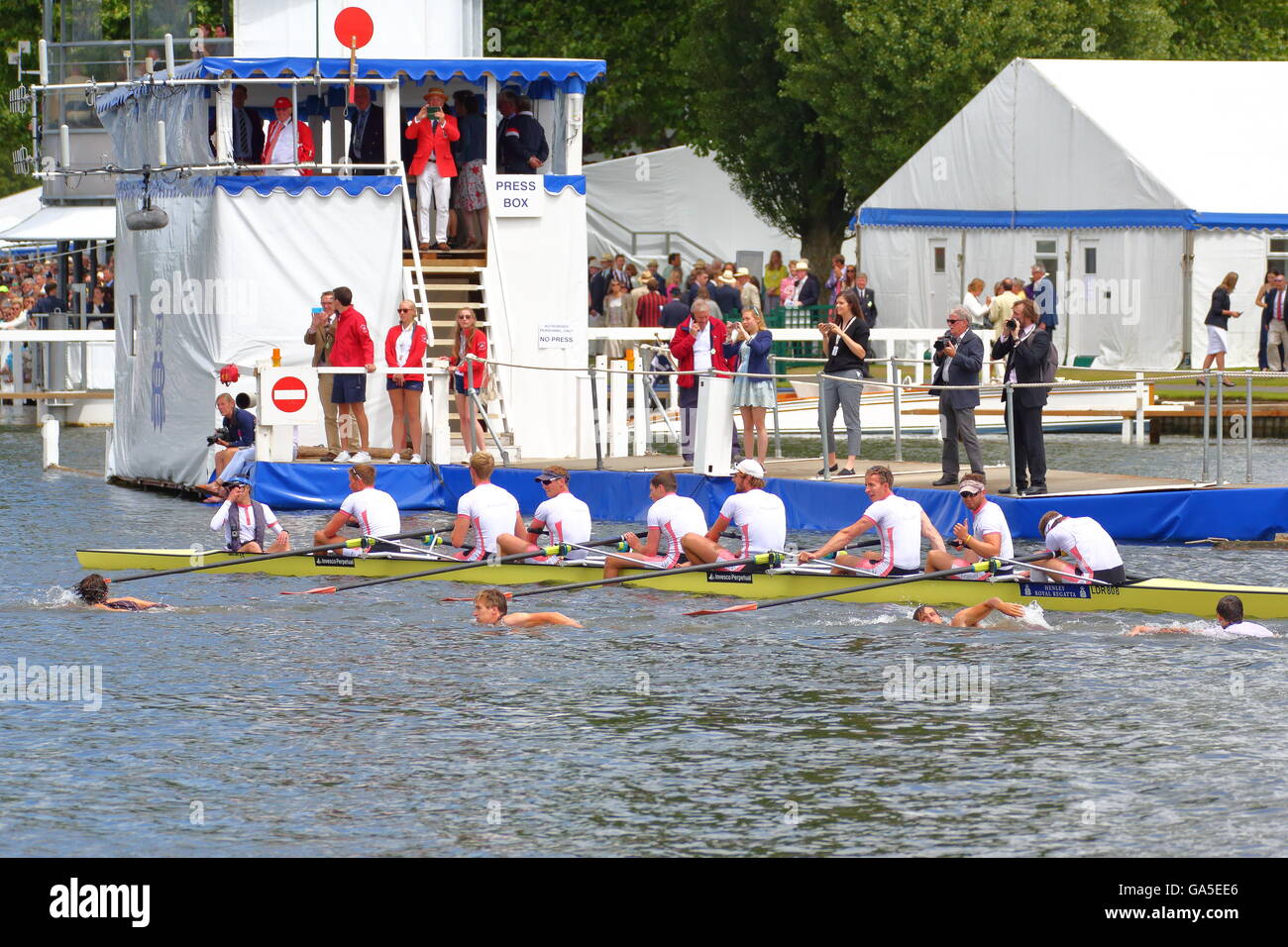 Rowers from all over the world came to the annual Henley Royal Regatta 2016. Nereus supporters swim towards their crew to congratulate them to their win. Stock Photo
