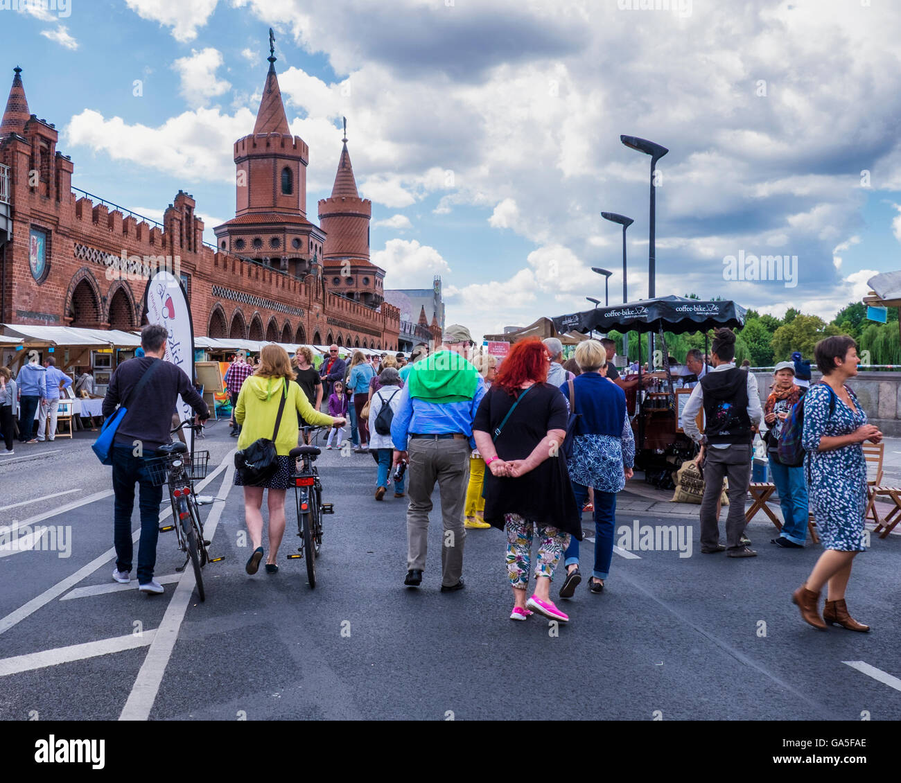 Berlin, Germany, 3rd July 2016. The Open Air Gallery is held twice every year and is open to professionals and young talents. More than a hundred artists display their works on the historic Oberbaum bridge between Kreuzberg and Friedrichshain.  Credit:  Eden Breitz/Alamy Live News Stock Photo
