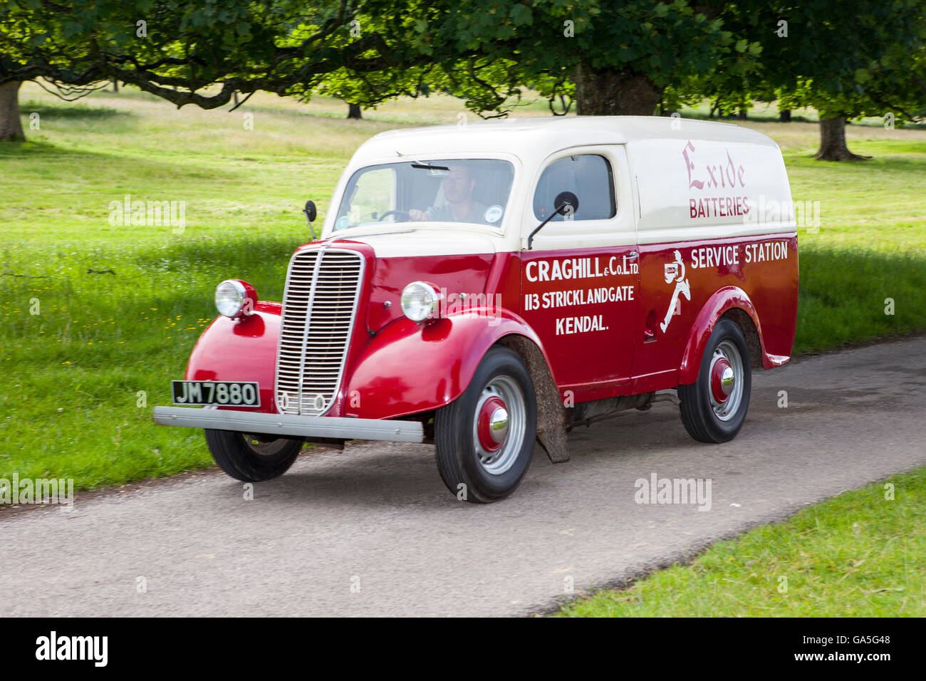 Maroon Cream Ford at Leighton Hall Classic Car Rally, Carnforth, Lancashire, UK. 3rd July, 2016.  The annual classic car rally takes place at the magnificent Leighton Hall in Carnforth in Lancashire.  British classic sports cars ranging from MG's to American muscle cars like the Dodge Vipers & Ford Mustangs.  The spectator event drew thousands of visitors to this scenic part of the country on the north west coast of England.  Credit:  Cernan Elias/Alamy Live News Stock Photo