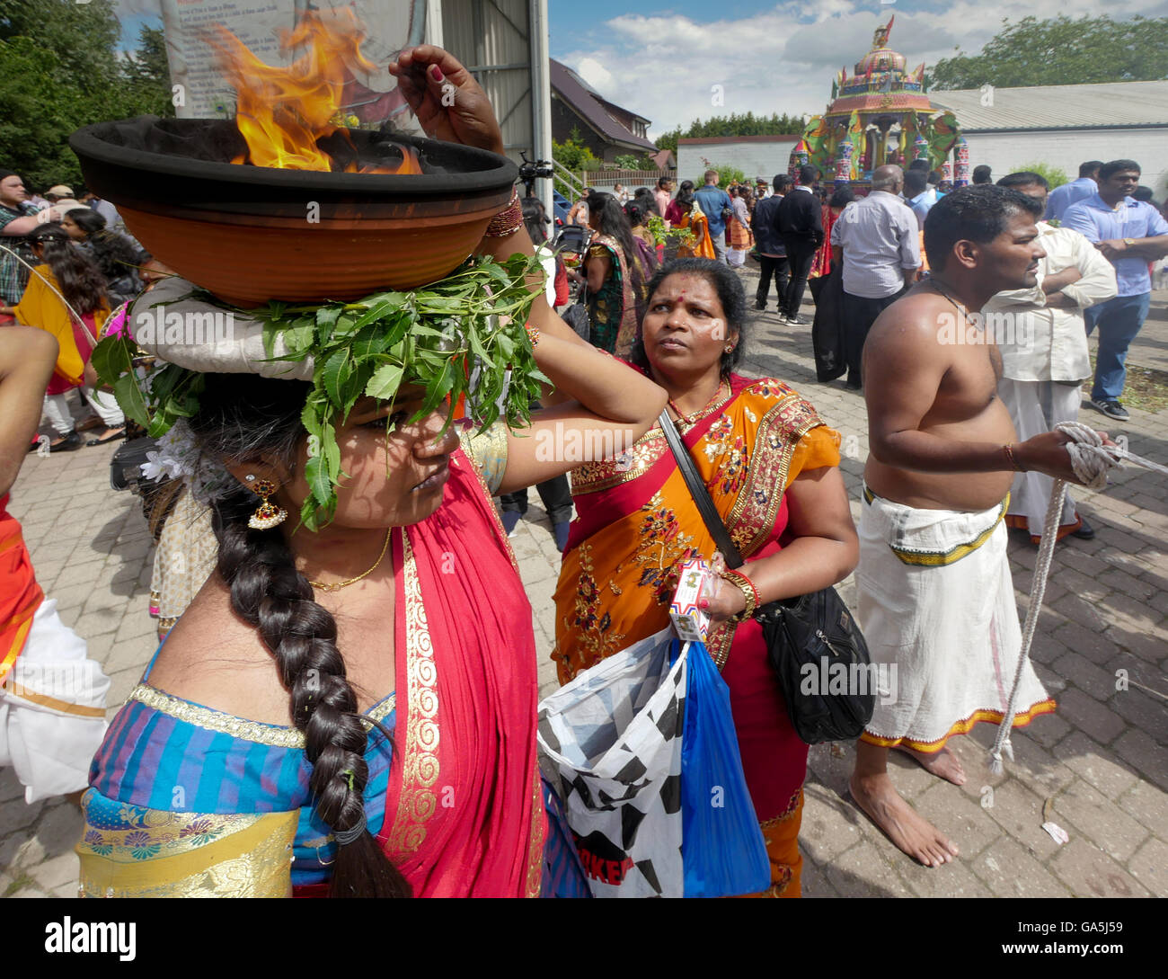 believing women with burning bowls, Sri KamadchiAmpal Temple priest