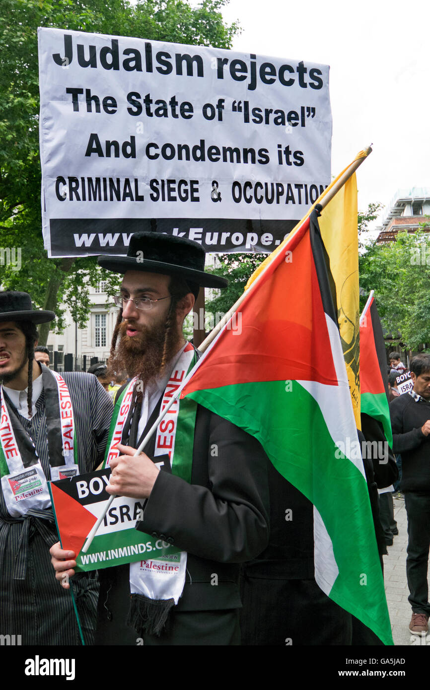 London, UK. 3rd July, 2016. Pro-Palestinian groups took part in a march and rally to commemorate Al-Quds Day. Organized by the Islamic Human Rights Commission the goal was to 'call for an end to racism, anti-semitism and Zionism. The March ended by the US Embassy and was met by an Israeli counter protest. Central London 3.7.16 Credit:  Janine Wiedel Photolibrary/Alamy Live News Stock Photo