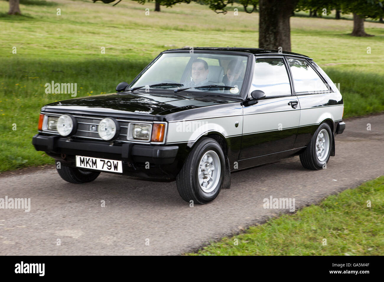 1980 80s black Sunbeam Lotus 2dr saloon at the annual classic car rally in Carnforth in Lancashire.  19809s British classic sports cars at the spectator event drew thousands of visitors to this scenic part of the country on the north west coast of England. Stock Photo