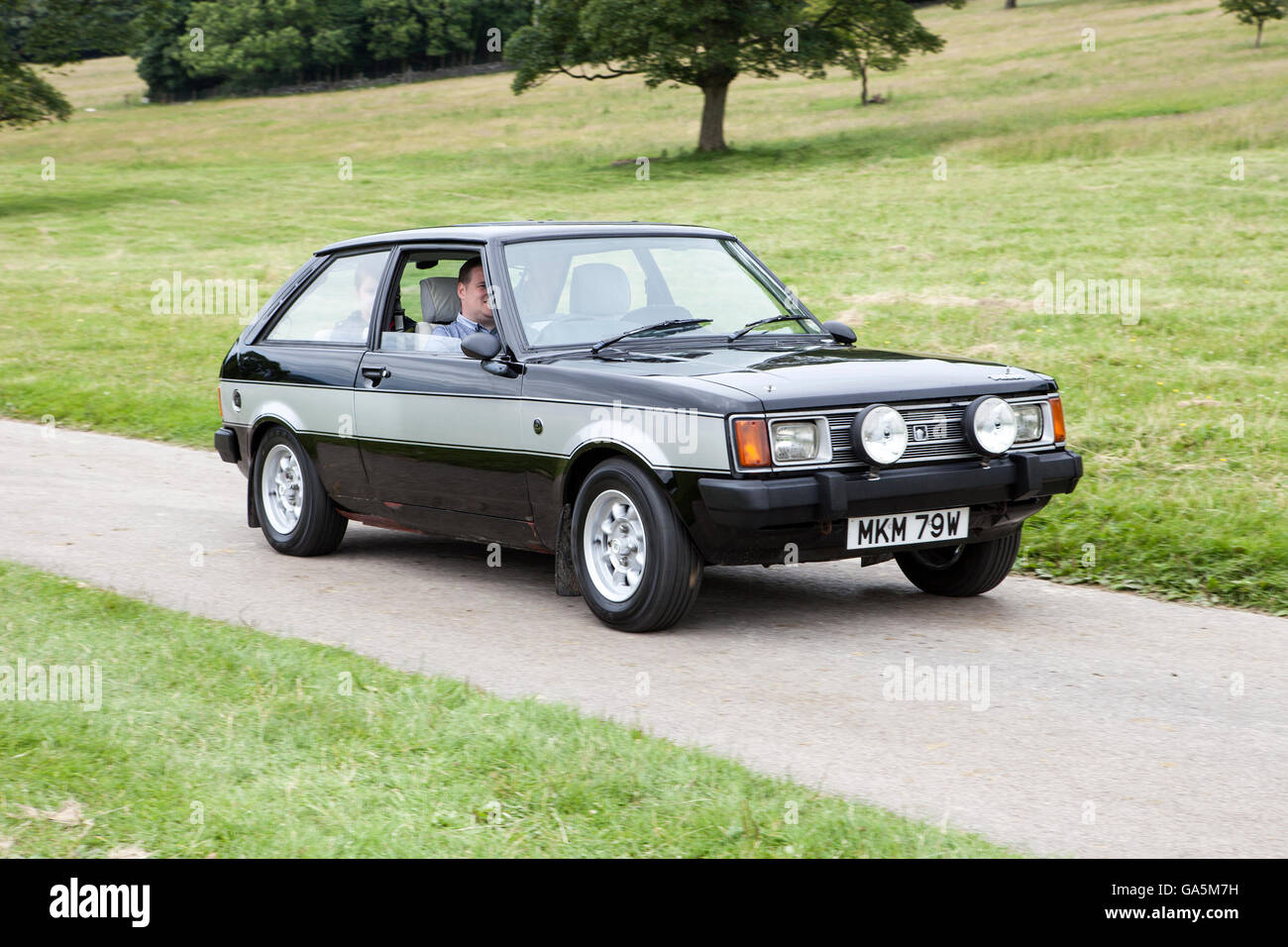 1980 80s black Sunbeam Lotus 2dr saloon at the annual classic car rally in Carnforth in Lancashire.  19809s British classic sports cars at the spectator event drew thousands of visitors to this scenic part of the country on the north west coast of England. Stock Photo