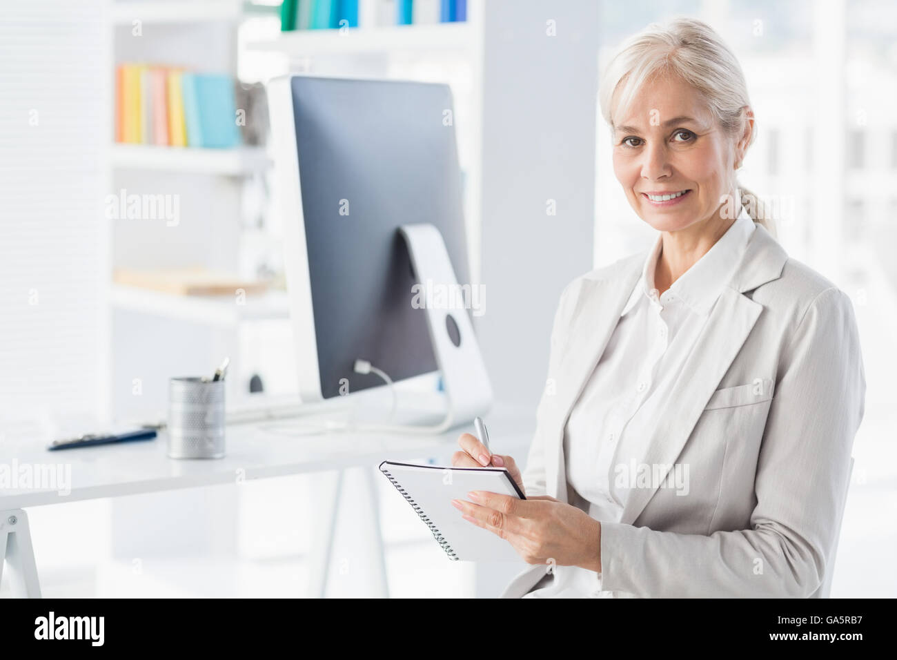 Portrait of smiling therapist Stock Photo - Alamy