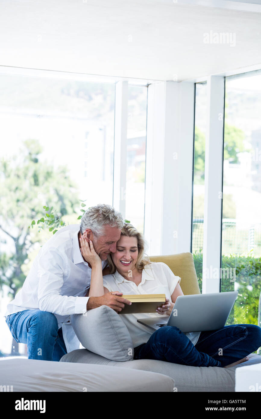 Romantic happy mature couple with gift box Stock Photo