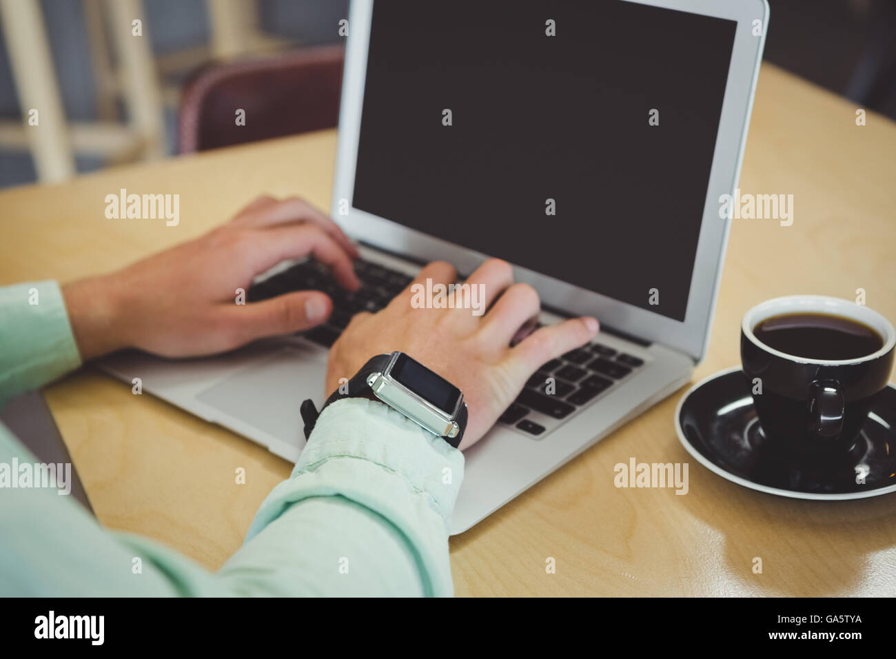 Man using laptop Stock Photo - Alamy