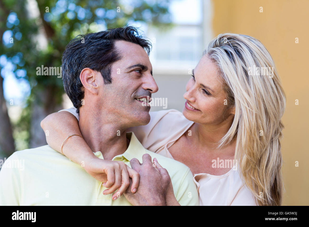 Romantic couple by building Stock Photo