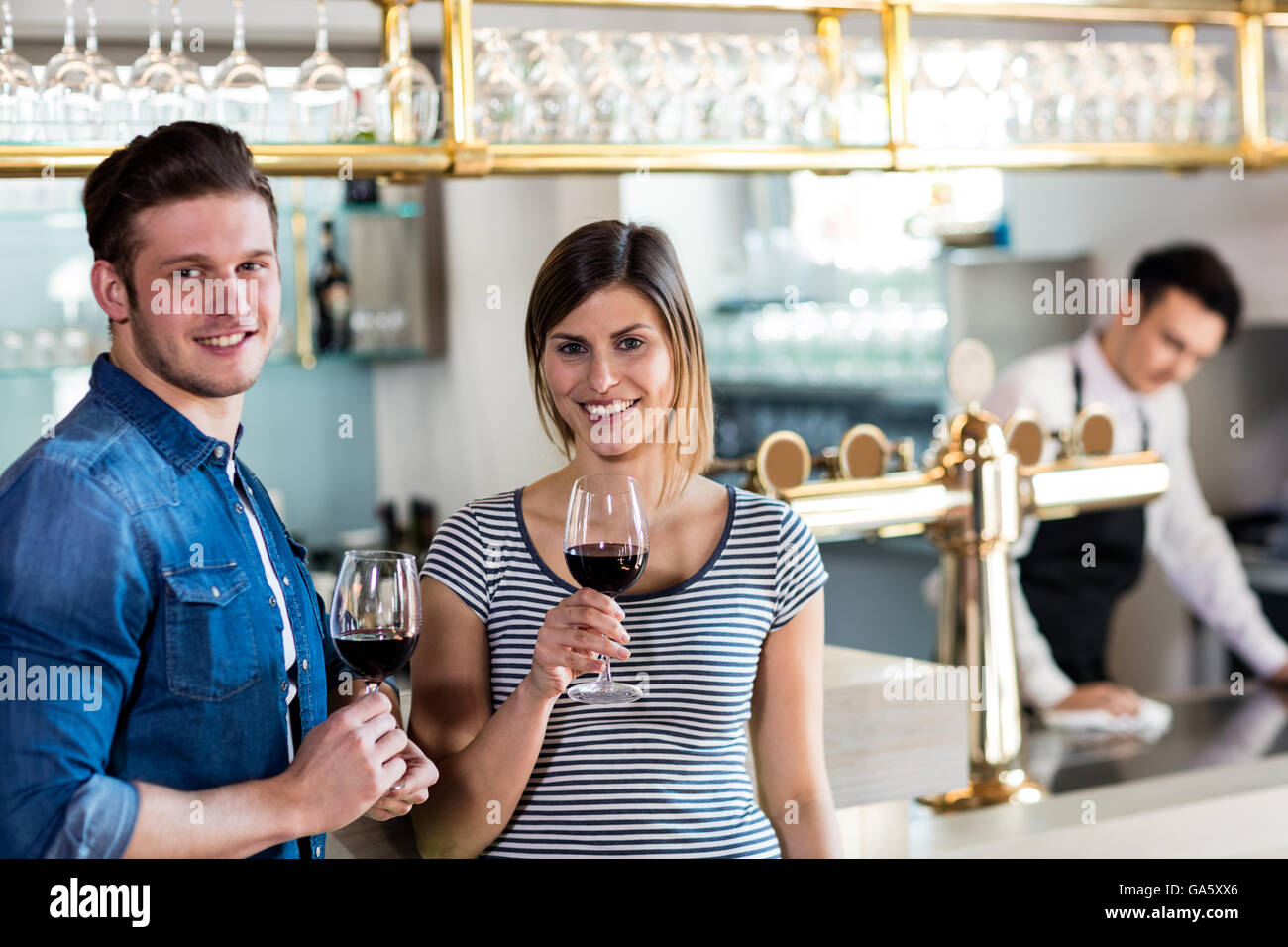 Happy young couple with wineglass Stock Photo