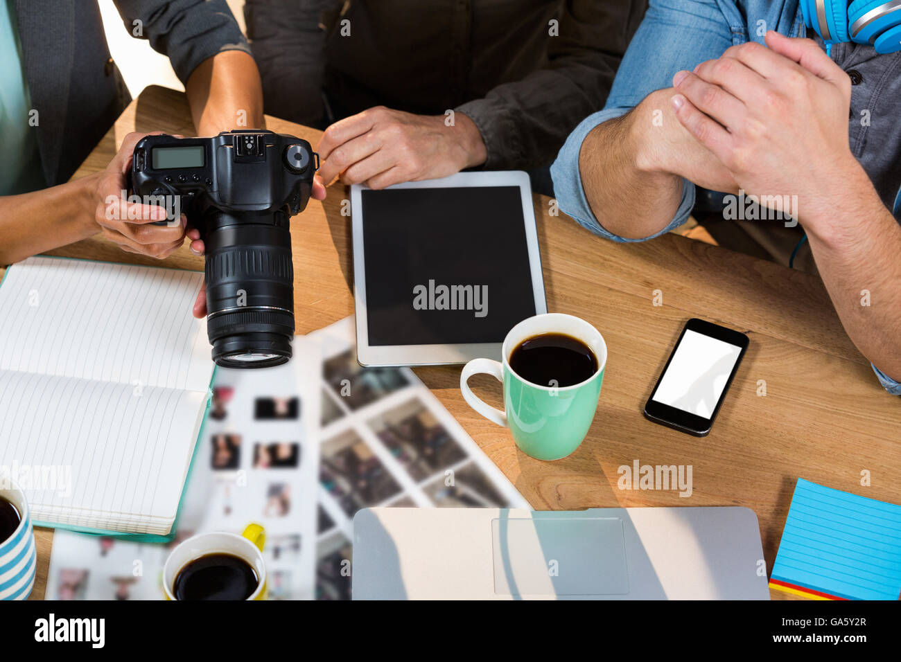 Business people working at table in creative office Stock Photo Alamy