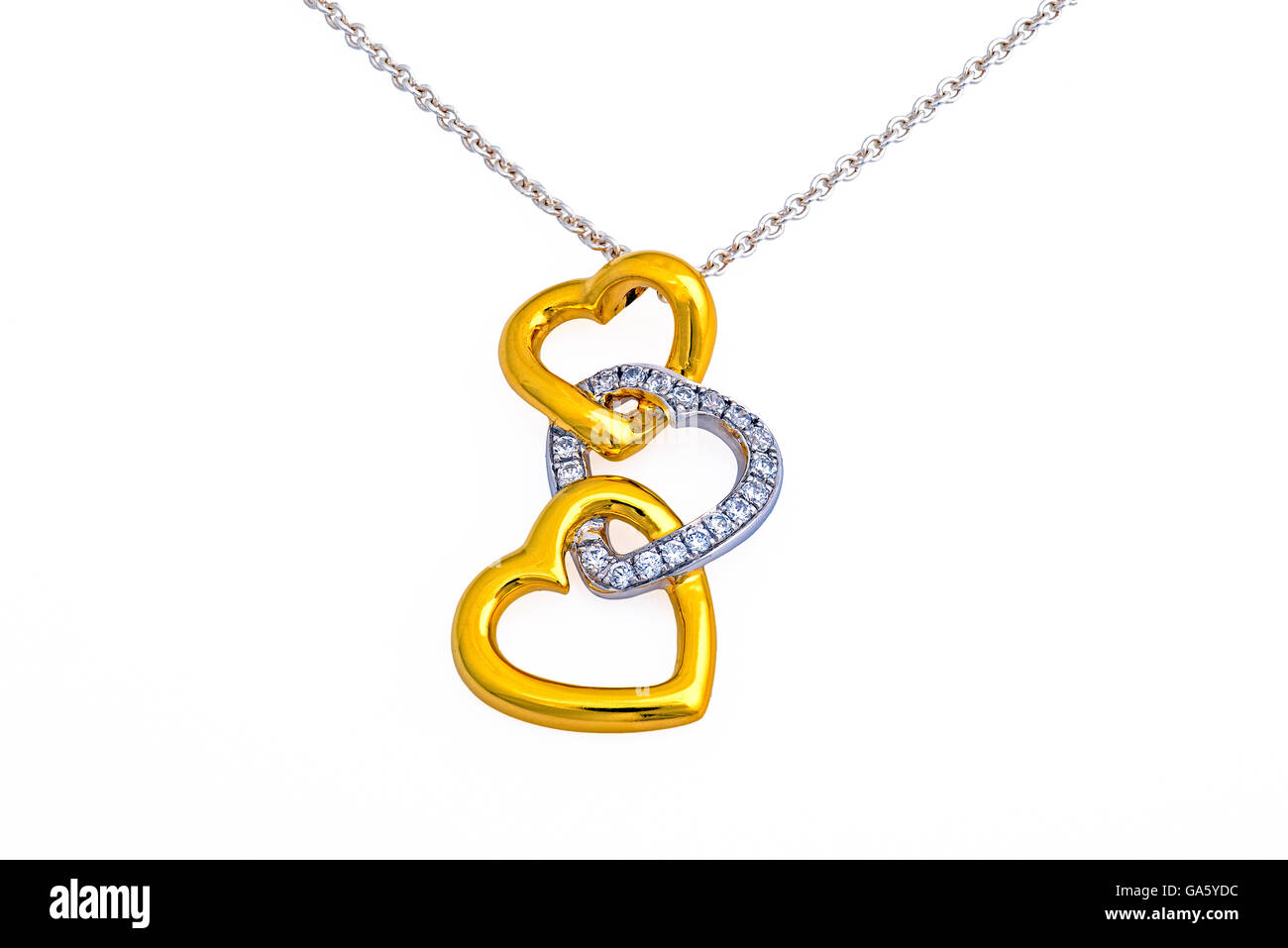 Gold pendant, necklace, 3 hearts on white background Stock Photo