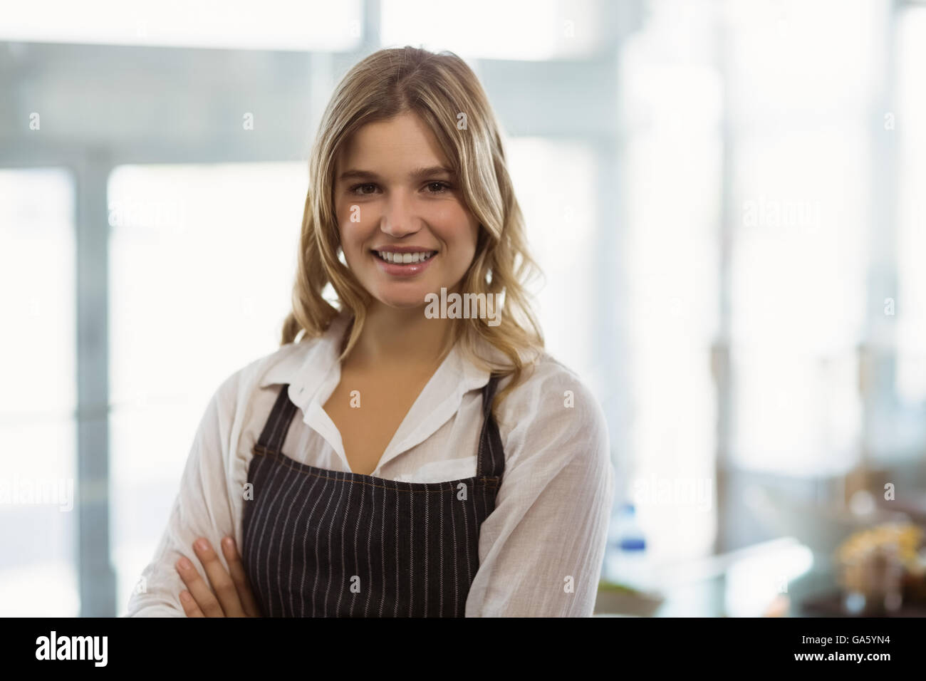 Portrait waitress standing arms hi-res stock photography and images - Alamy