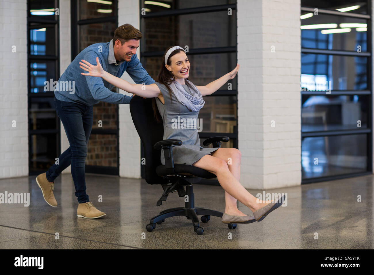 Playful colleagues in creative office Stock Photo