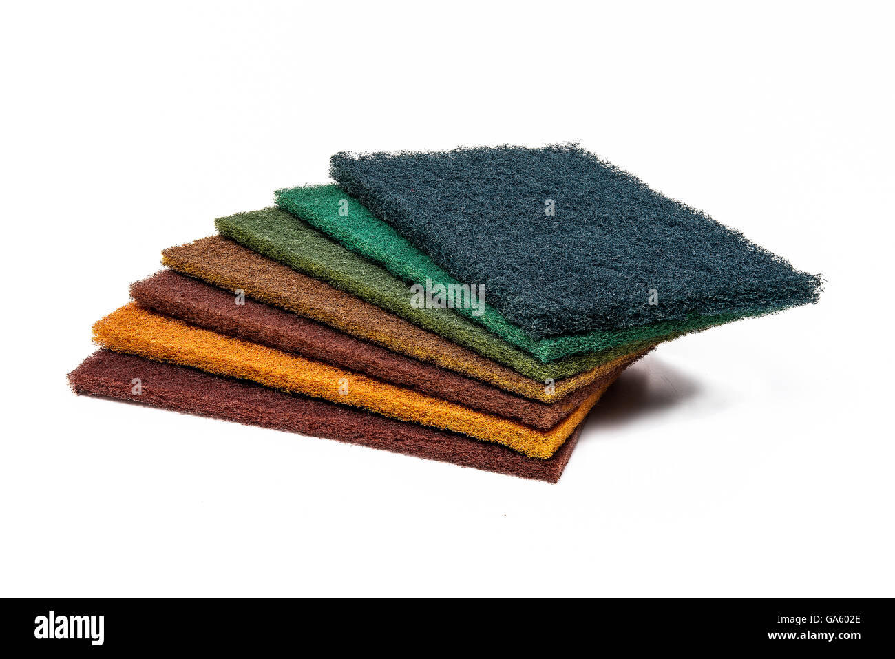 Scrubber pads set of 7 colors for kitchen cleaning on white background