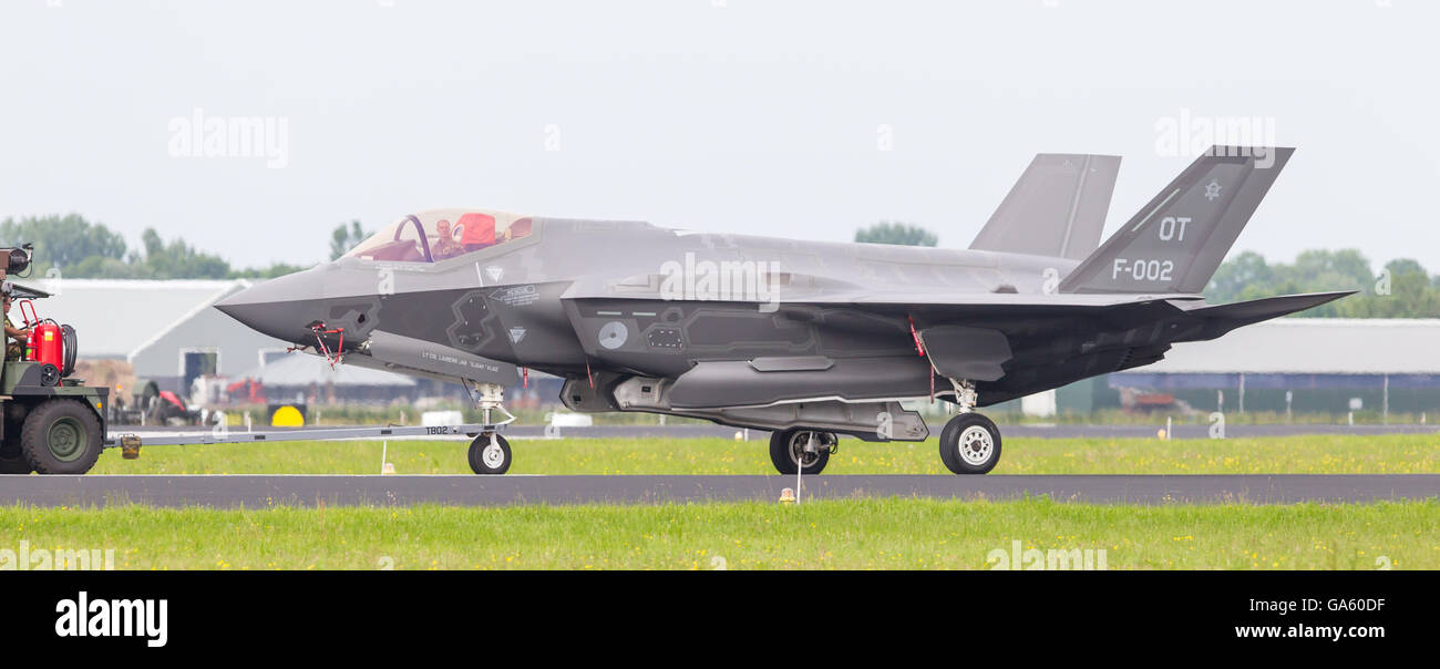 LEEUWARDEN, NETHERLANDS - JUNE 11 2016: F35 Joint Strike Fighter is towed to the hangar after a demonstration flight at the Dutc Stock Photo