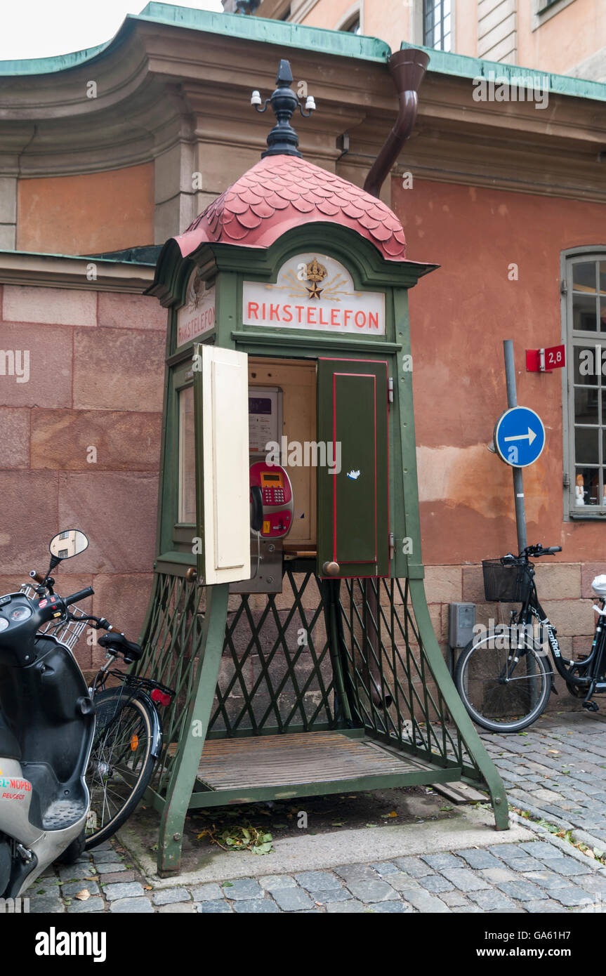 Vintage public telephone booth in Gamla Stan, the old town of Stockholm, Sweden. Stock Photo