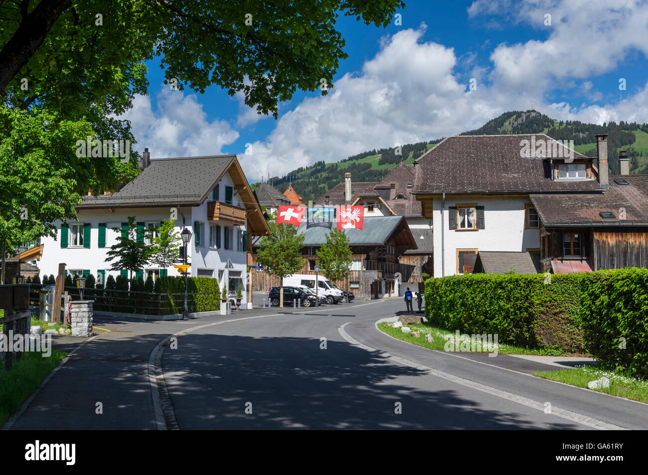 Main street of Saanen, a village in the Swiss Alps. Saanen, Berner Oberland, Switzerland. Stock Photo