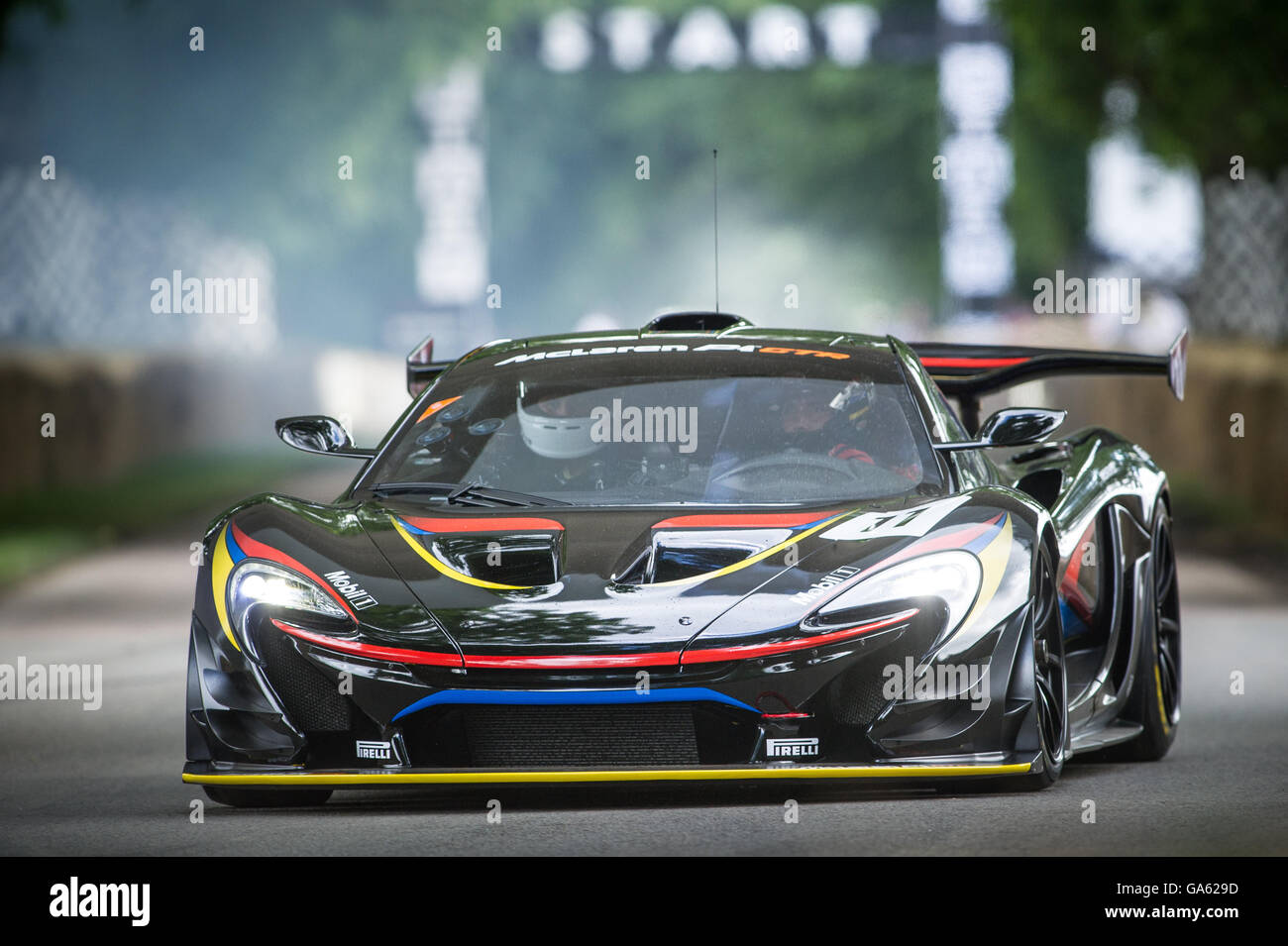 A McLaren P1 GTR drives up the hill during the Super Car Run at the Goodwood Festival of Speed 2016 Stock Photo
