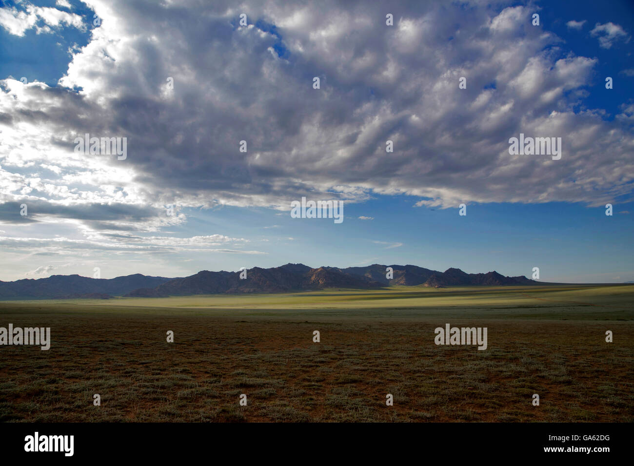 Steppes of Mongolia. Inner of Asia. Stunning view sky and mountain. Stock Photo
