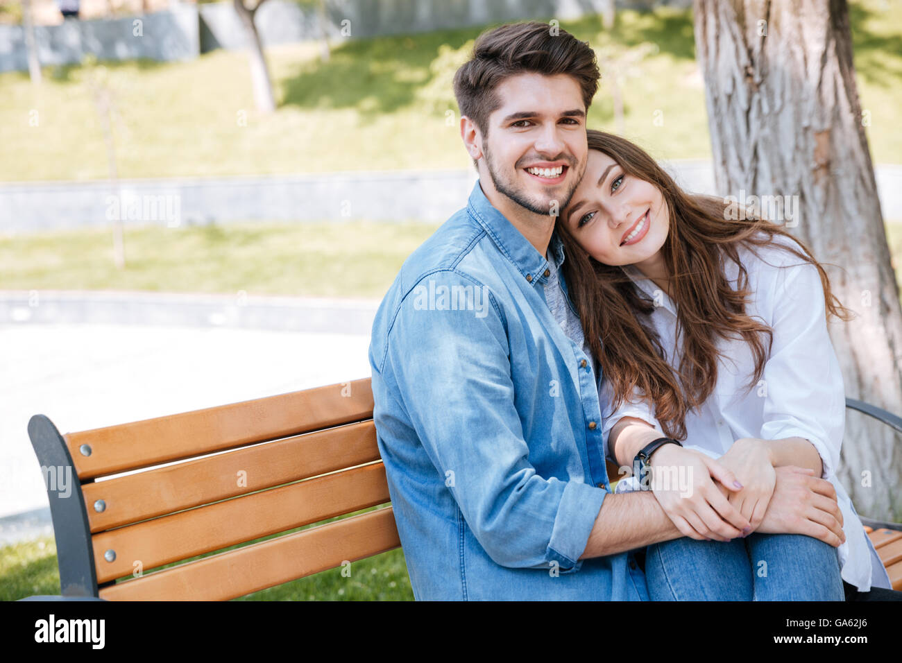 Young Couple Posing Seated Modern Sofa Stock Photos - Free & Royalty-Free  Stock Photos from Dreamstime