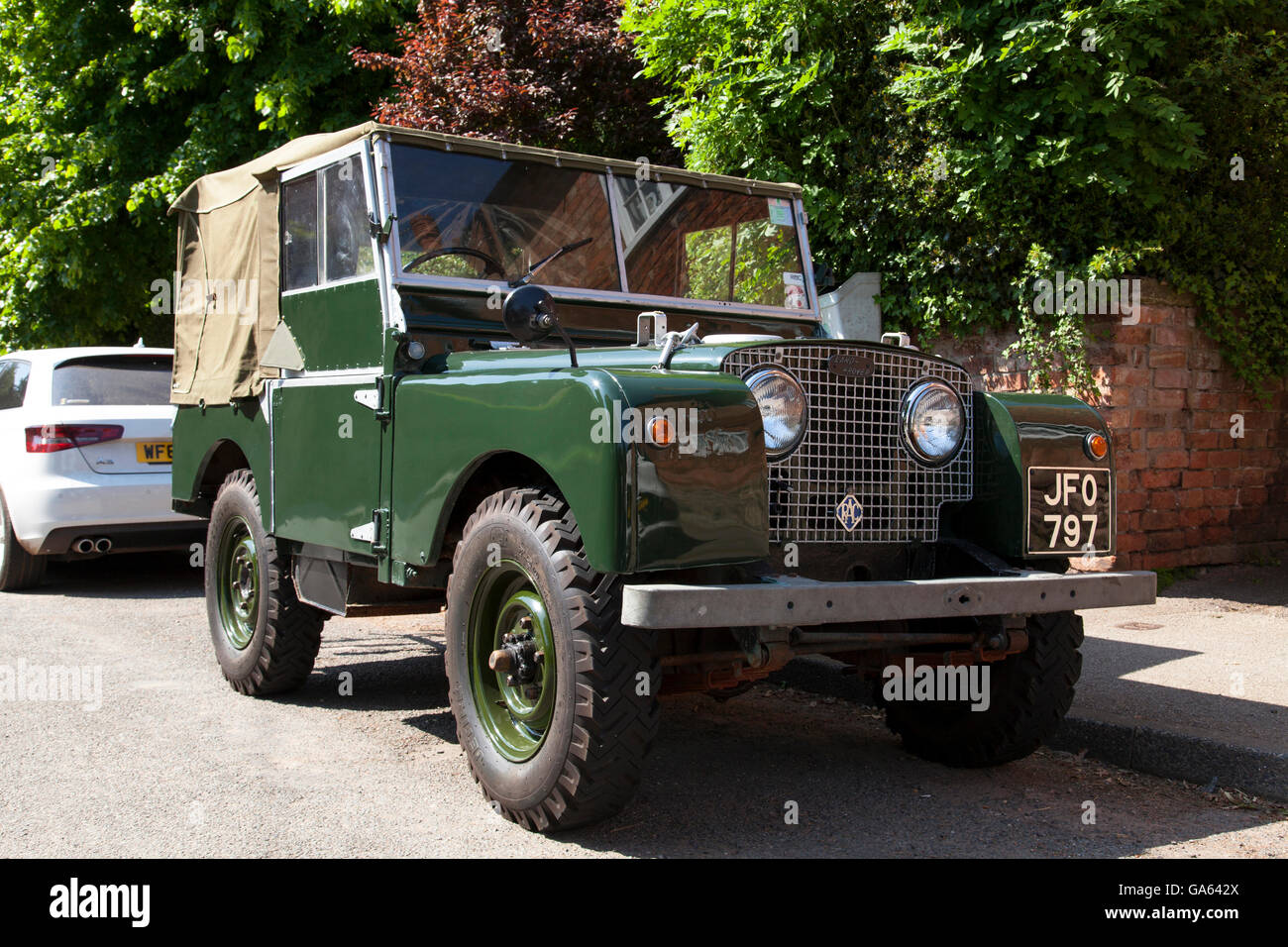 A restored classic Land Rover i a village in the U.K. Stock Photo