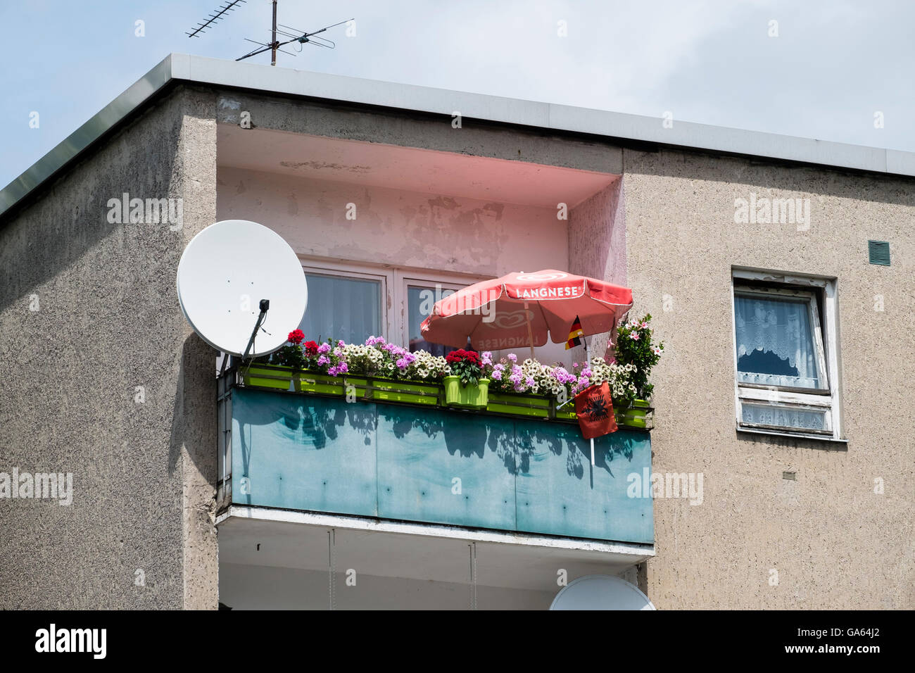 Decorated balcony of social housing apartment building in Neukolln Berlin Germany Stock Photo