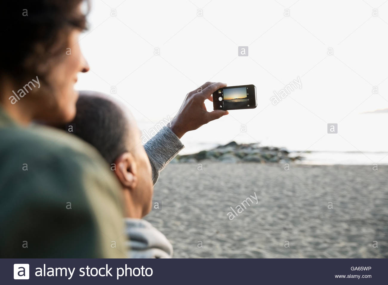 Phone on beach hi-res stock photography and images - Alamy