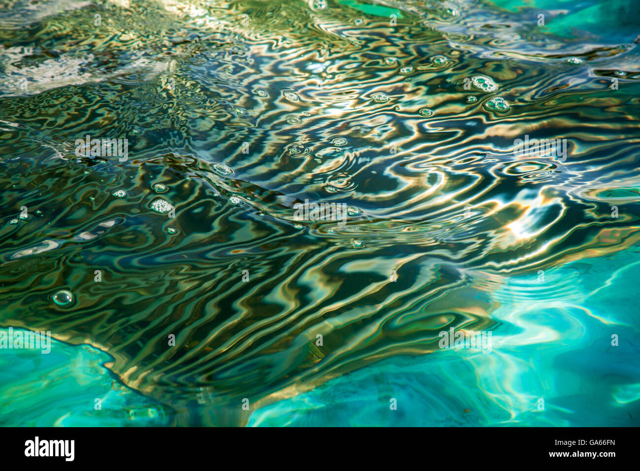 abstract bright multicoroled reflection in water Stock Photo