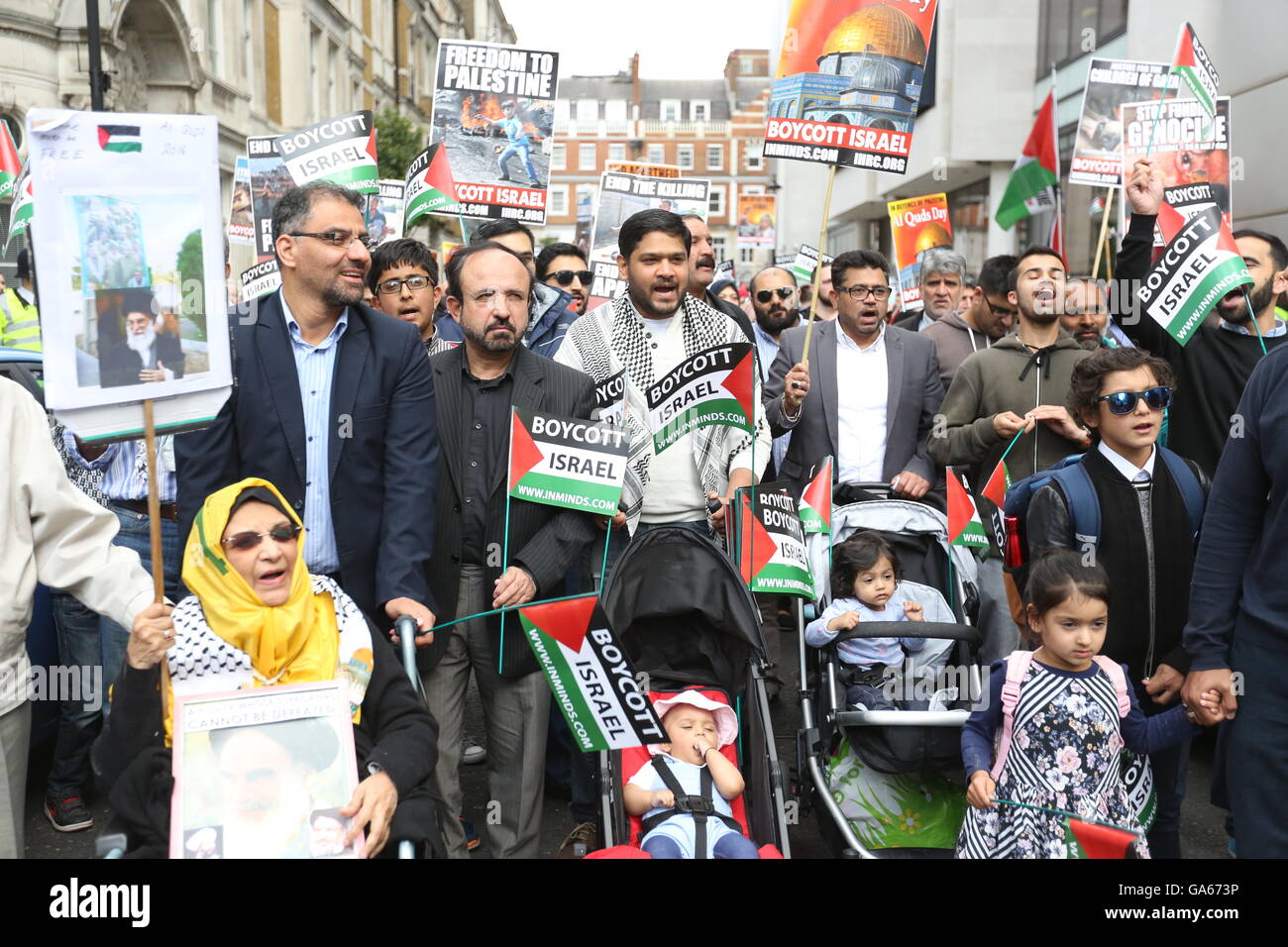 Pro-Palestinian supporters take part in a rally in central London, to commemorate Al-Quds Day, a day that has been marked globally since being inaugurated in 1979 by Ayatollah Khomeini who asked for the last Friday in the Islamic holy month of Ramadan to be set aside as a day for uniting against Israel and showing support for Palestinians. Stock Photo