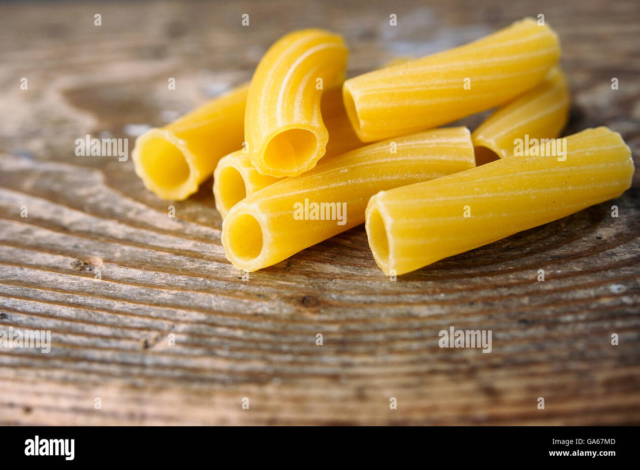 Rigatoni: italian short ridged pasta. Stock Photo