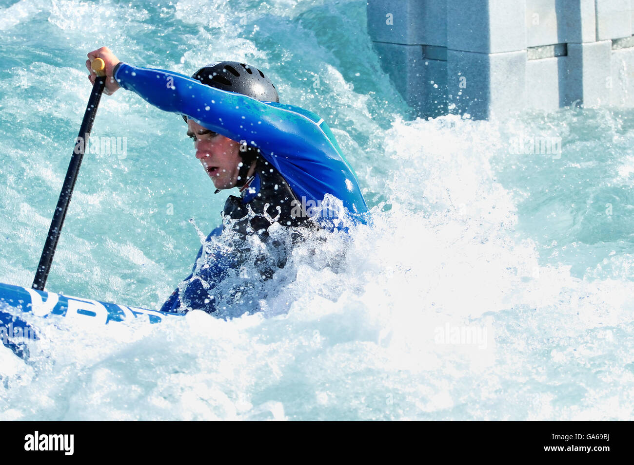 A canoeist at the 2012 Olympic White Water Centre on opening day, Lee Valley White Water Centre, Hertfordshire, England Stock Photo