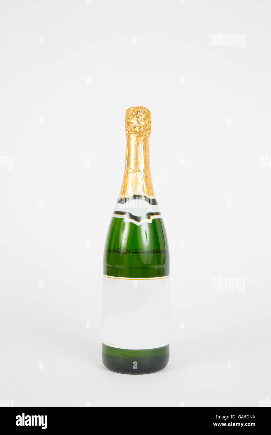 A champagne bottle on a white background Stock Photo - Alamy