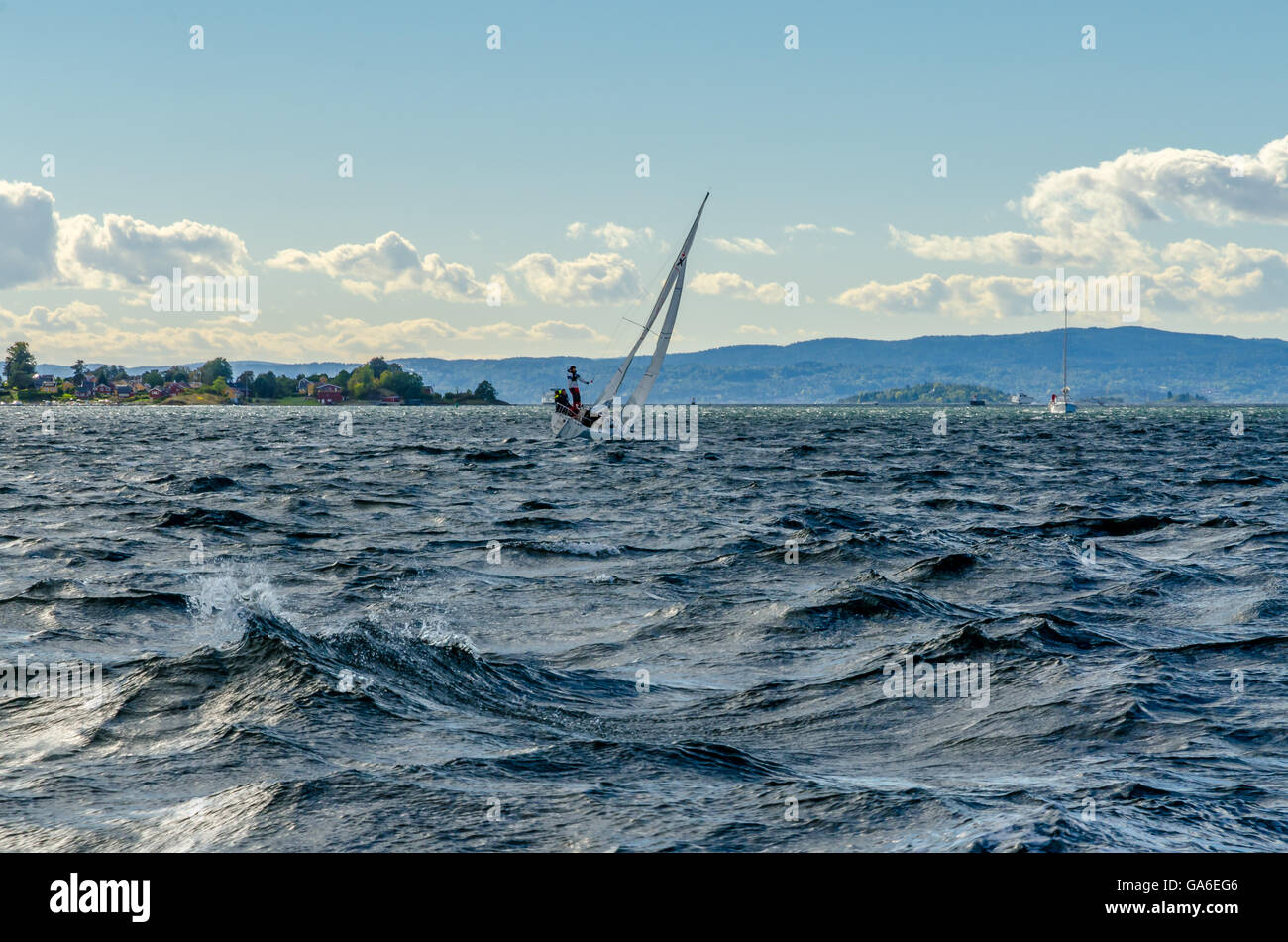 Small boat in the port of Oslo under clouds sky, Norway Stock Photo - Alamy