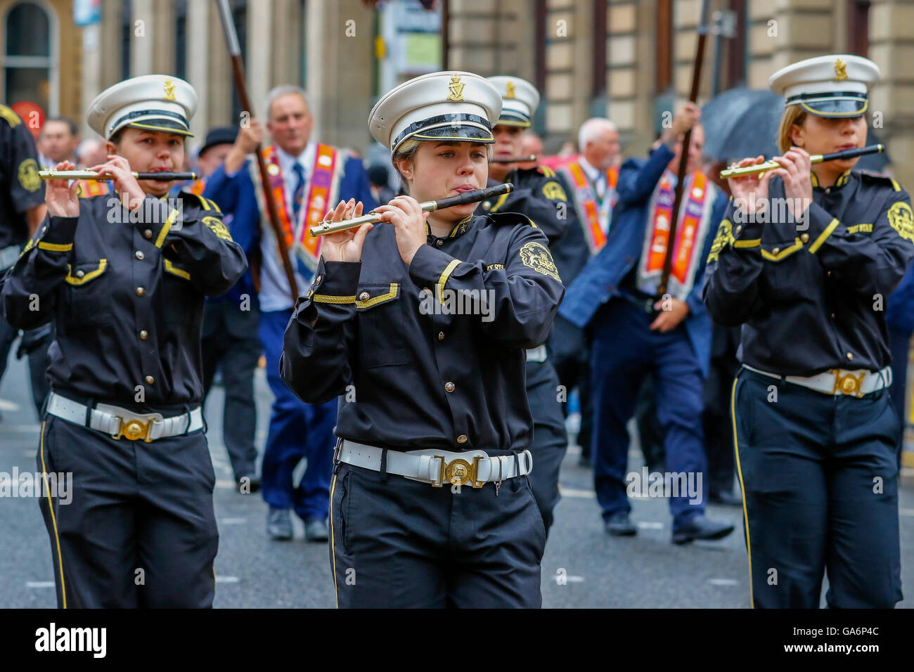 Female members of an Orange Lodge Flute and playing at a parade in Glasgow, Scotland, UK Stock Photo