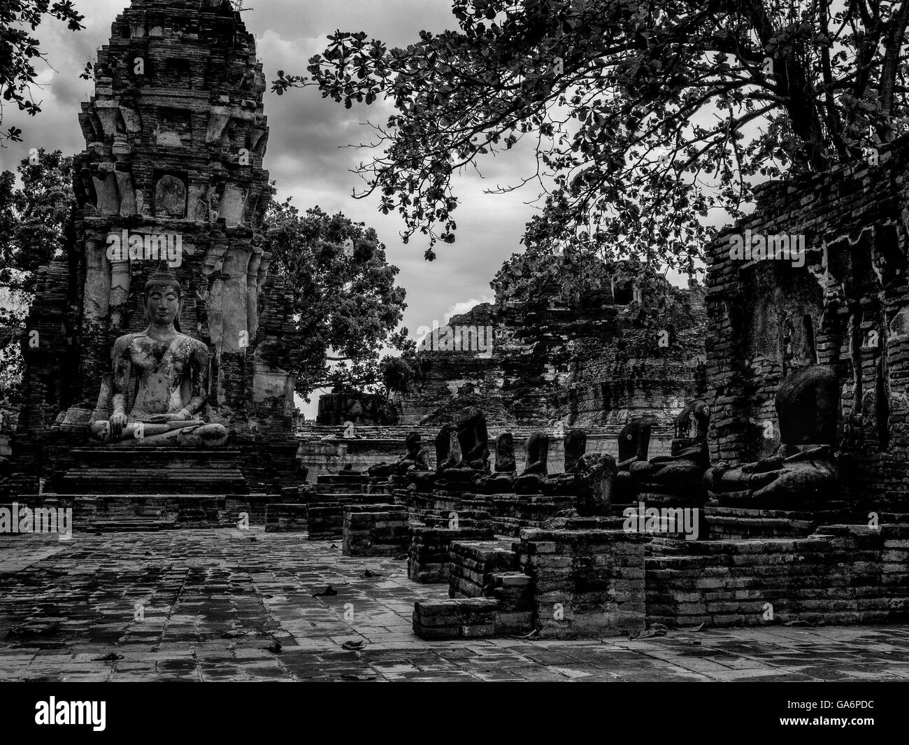 Buddha statues in temple ruins Wat Mahathat Ayutthaya thailand Stock Photo