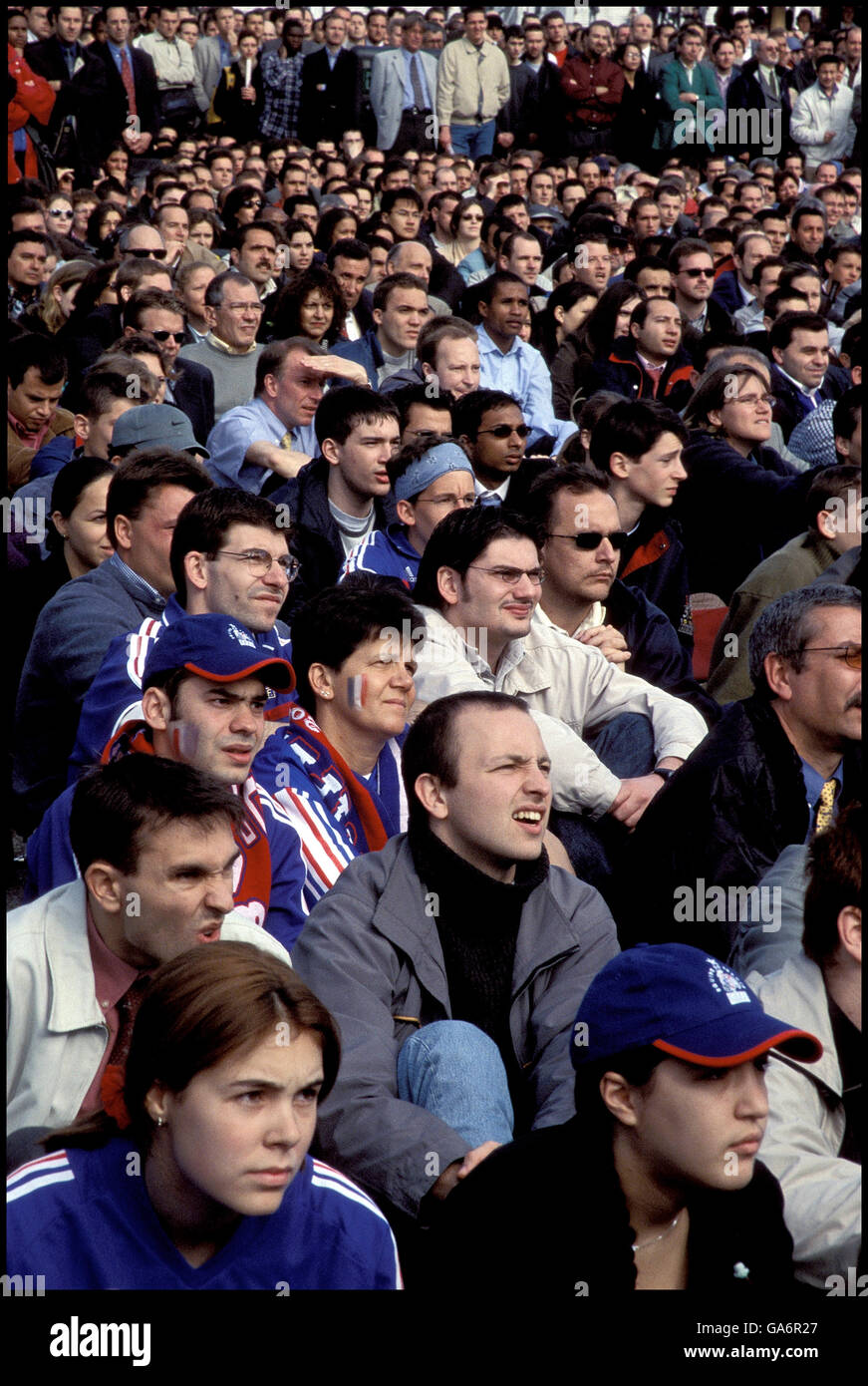French soccer fans watch game on giant screen June 2002 at La Défense, France. Stock Photo