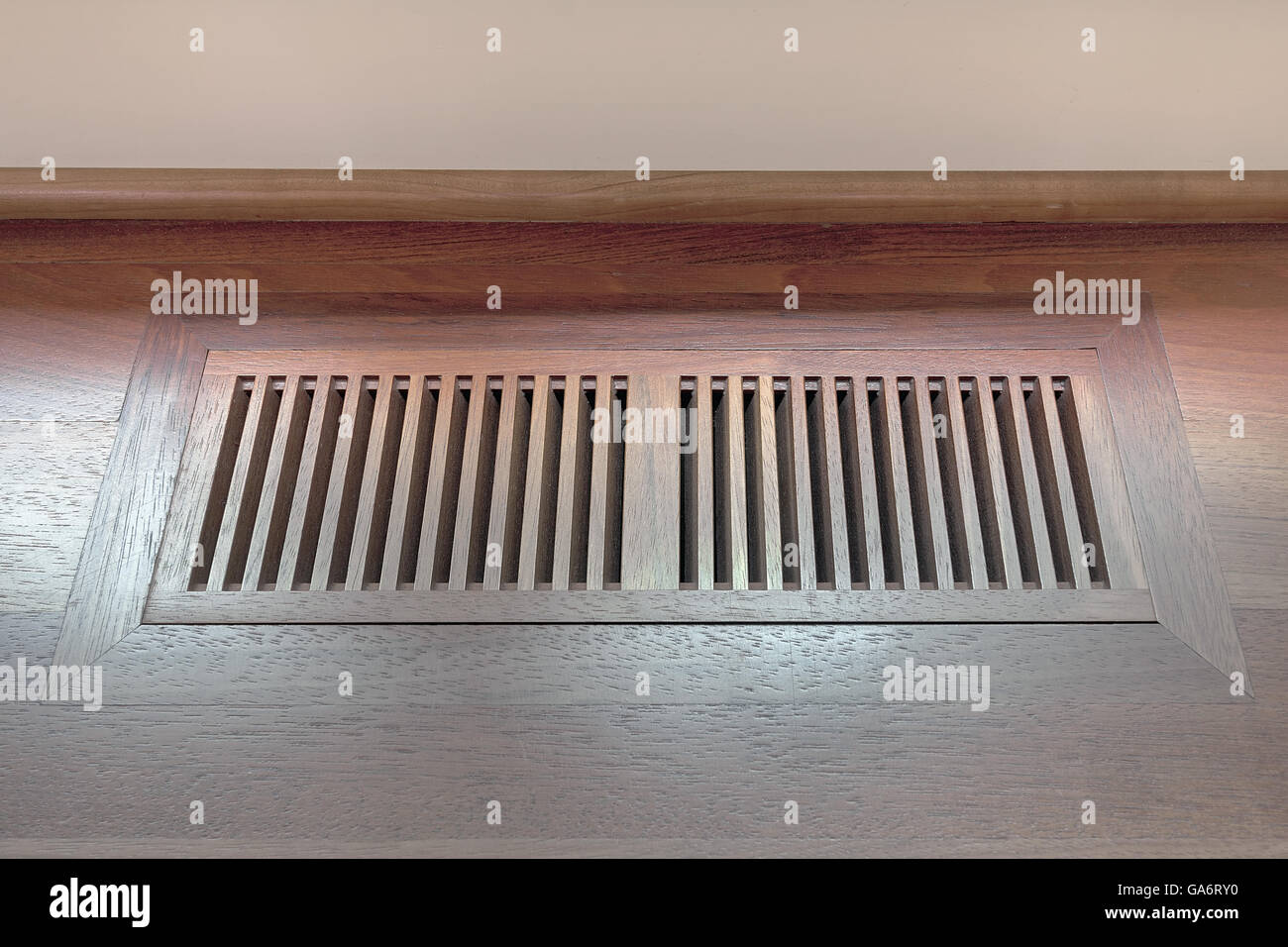 Wood Floor Vent Cover for home heating and cooling system Stock Photo
