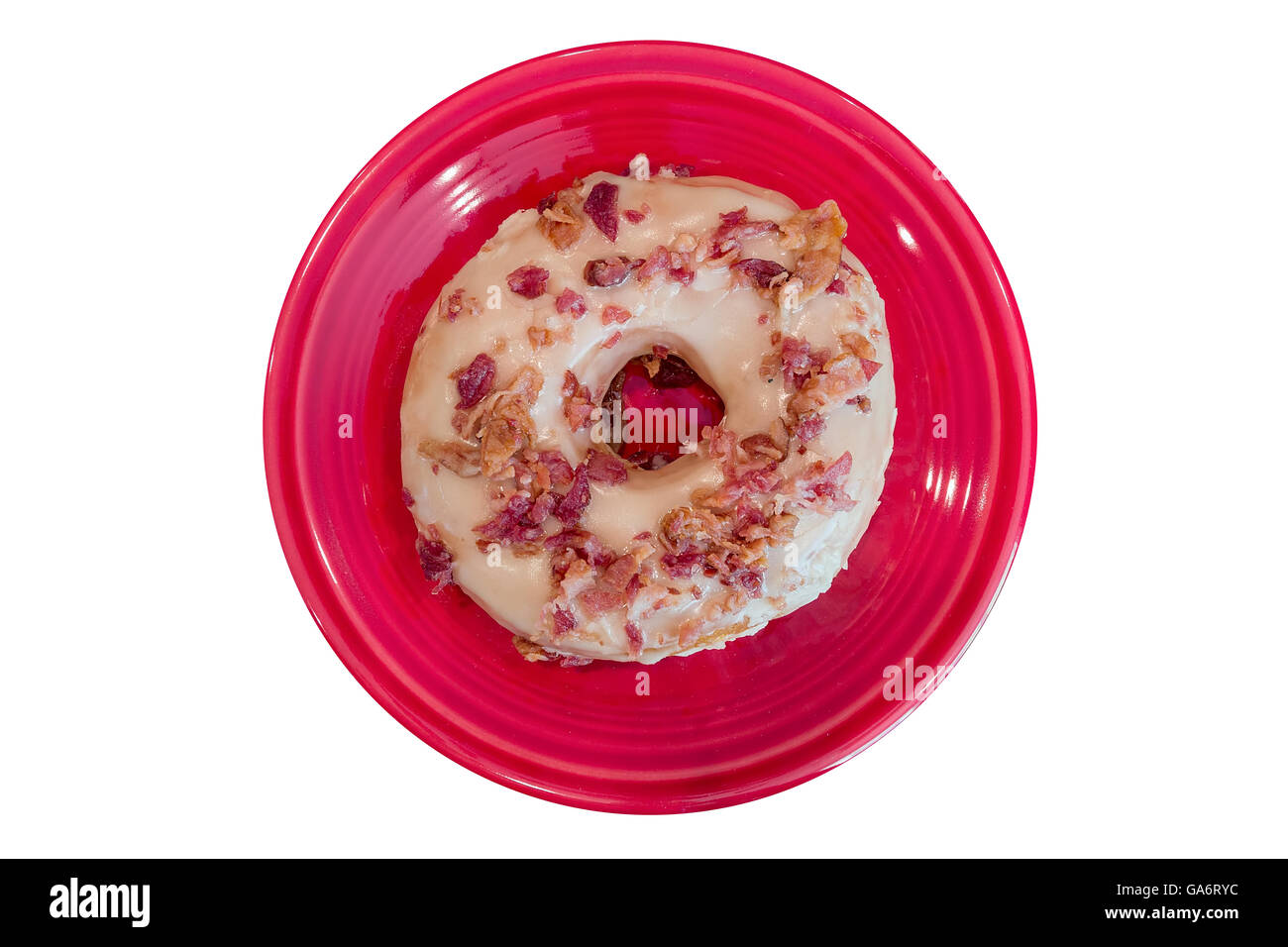 Bacon and Maple Donut on Red dessert plate isolated white background closeup macro Stock Photo