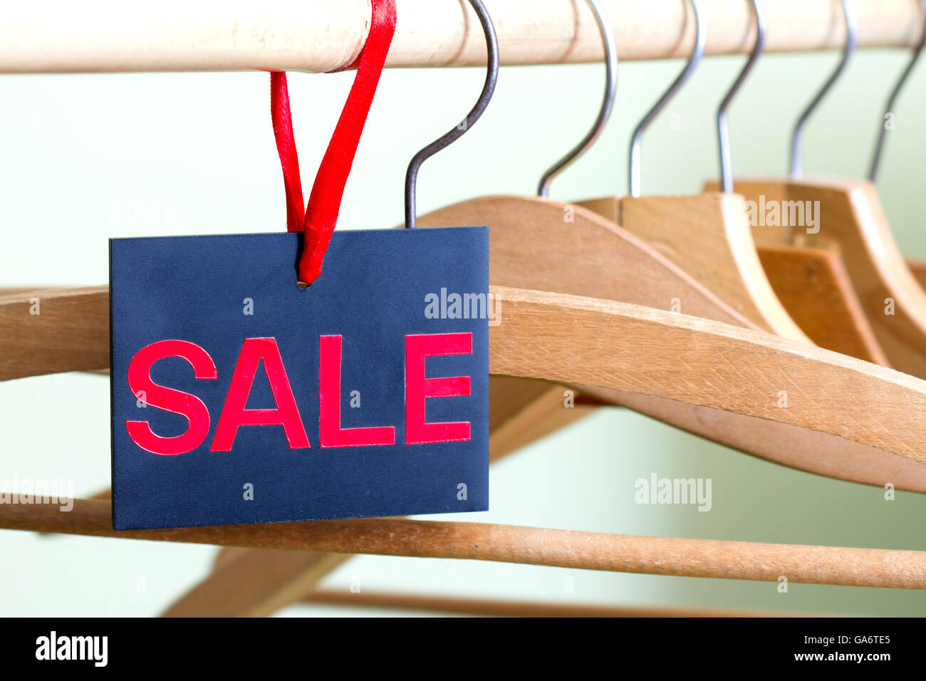 Sale of clothing concept with empty hangers Stock Photo