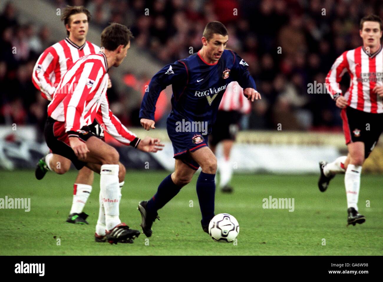 Sunderland's Kevin Phillips is closed down by Southampton's Claus Lundekvam (l) Stock Photo