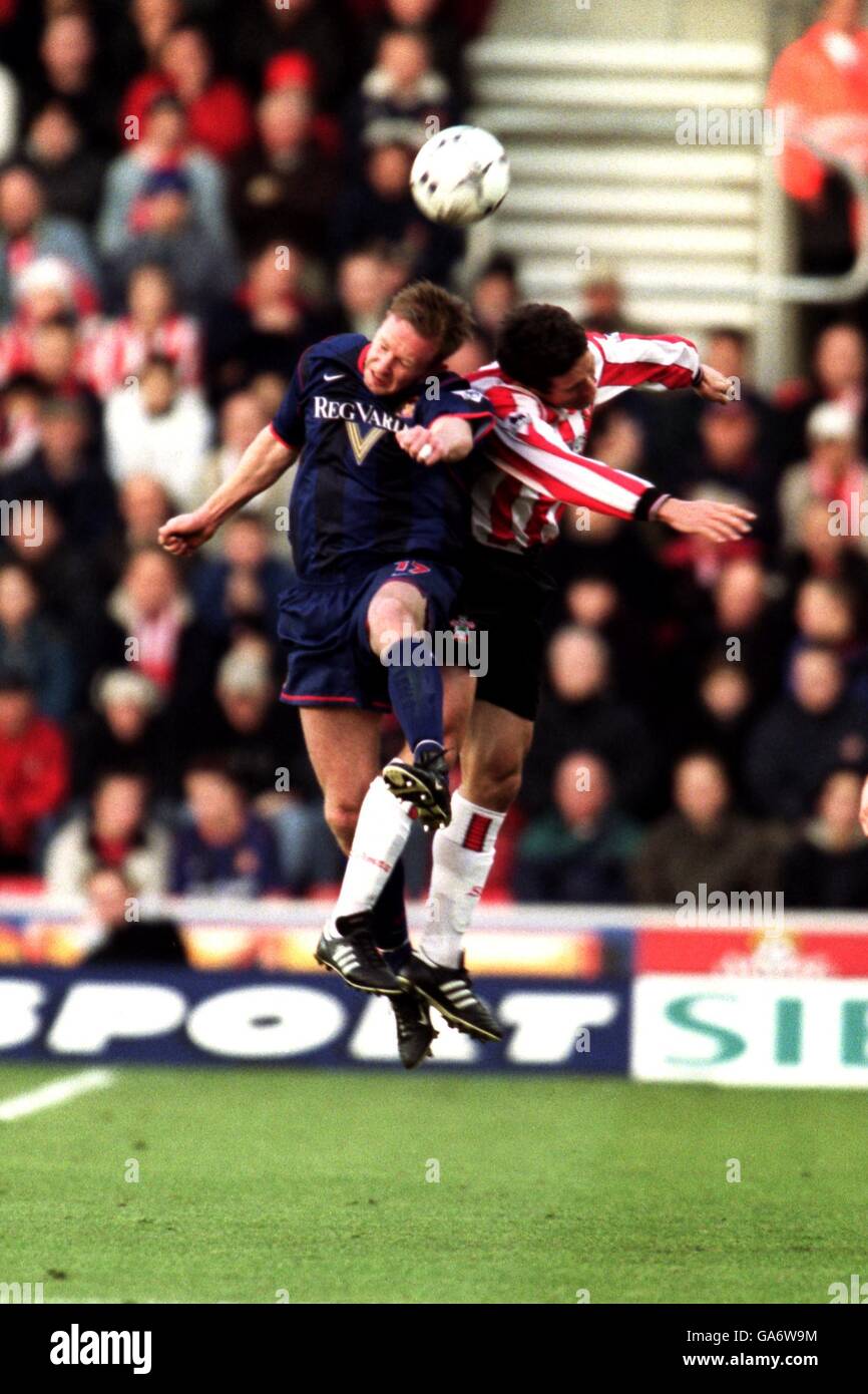 Southampton's Paul Telfer jumps for the ball with Sunderland's Jody Craddock Stock Photo