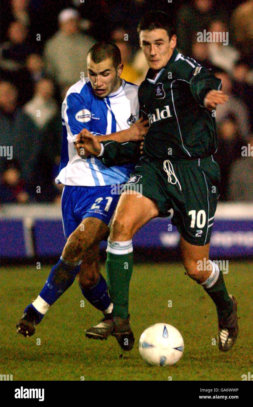 Soccer - AXA FA Cup - Second Round - Replay - Bristol Rovers v Plymouth Argyle. Bristol Rovers' Lewis Hogg challenges Plymouth Argyle's Ian Stonebridge Stock Photo