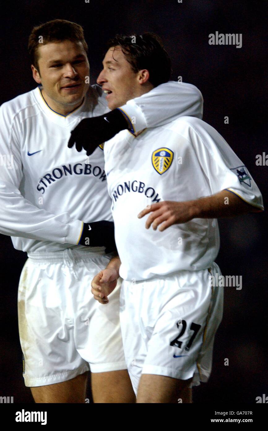 lr; Leeds United's Mark Viduka congratulates goalscorer Robbie Fowler